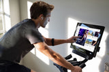 NordicTrack Commercial S22i Studio Cycle + Assinatura IFit Familiar Gratis